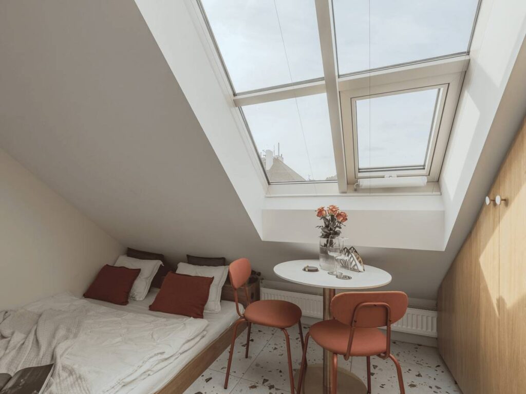 small-loft-bedroom-with-dining-table airbnb prague